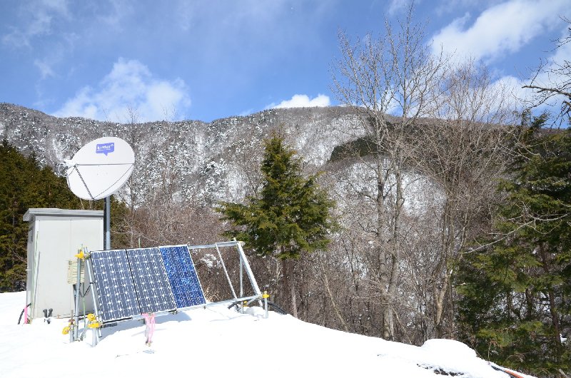 satellite internet dish, solar generator and control house.
